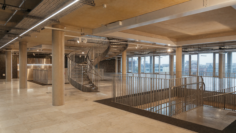 Office floorplate - continuous linear runs, spiral stair and perimeter glazing