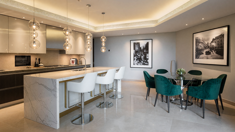 Apartment kitchen and dining - marble island, tray ceiling cove and dining area