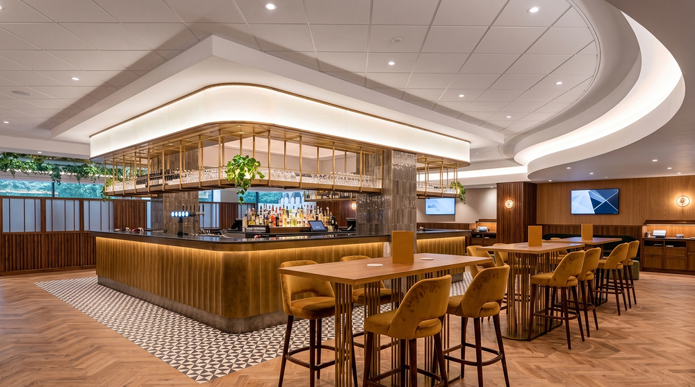 Bar and lounge - illuminated bar canopy, brass fluted bar front and high tables