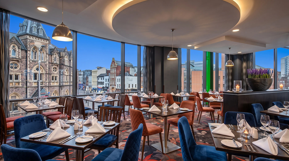 Restaurant - window tables, dome pendants and circular ceiling raft